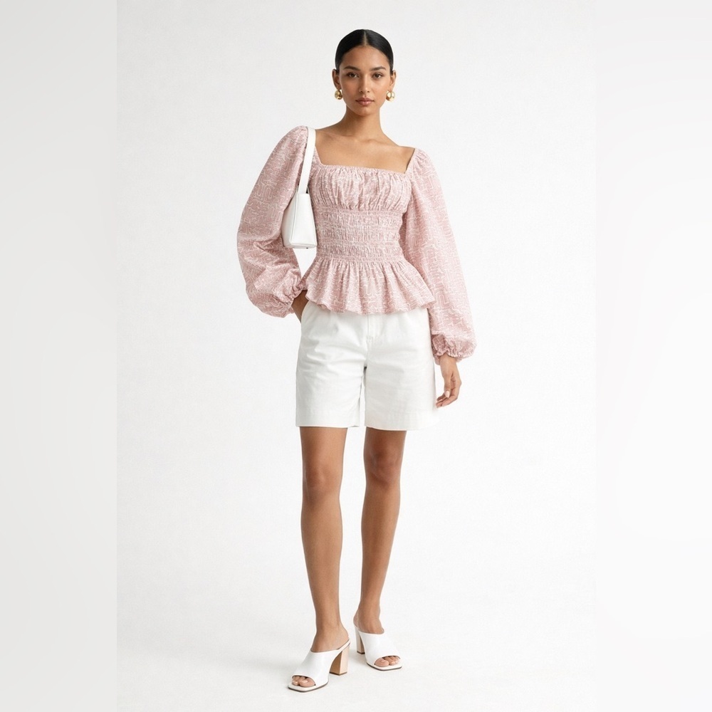 STAUD Jules smocked puff-sleeve peplum top in pink & cream "Pastel Maze" pattern